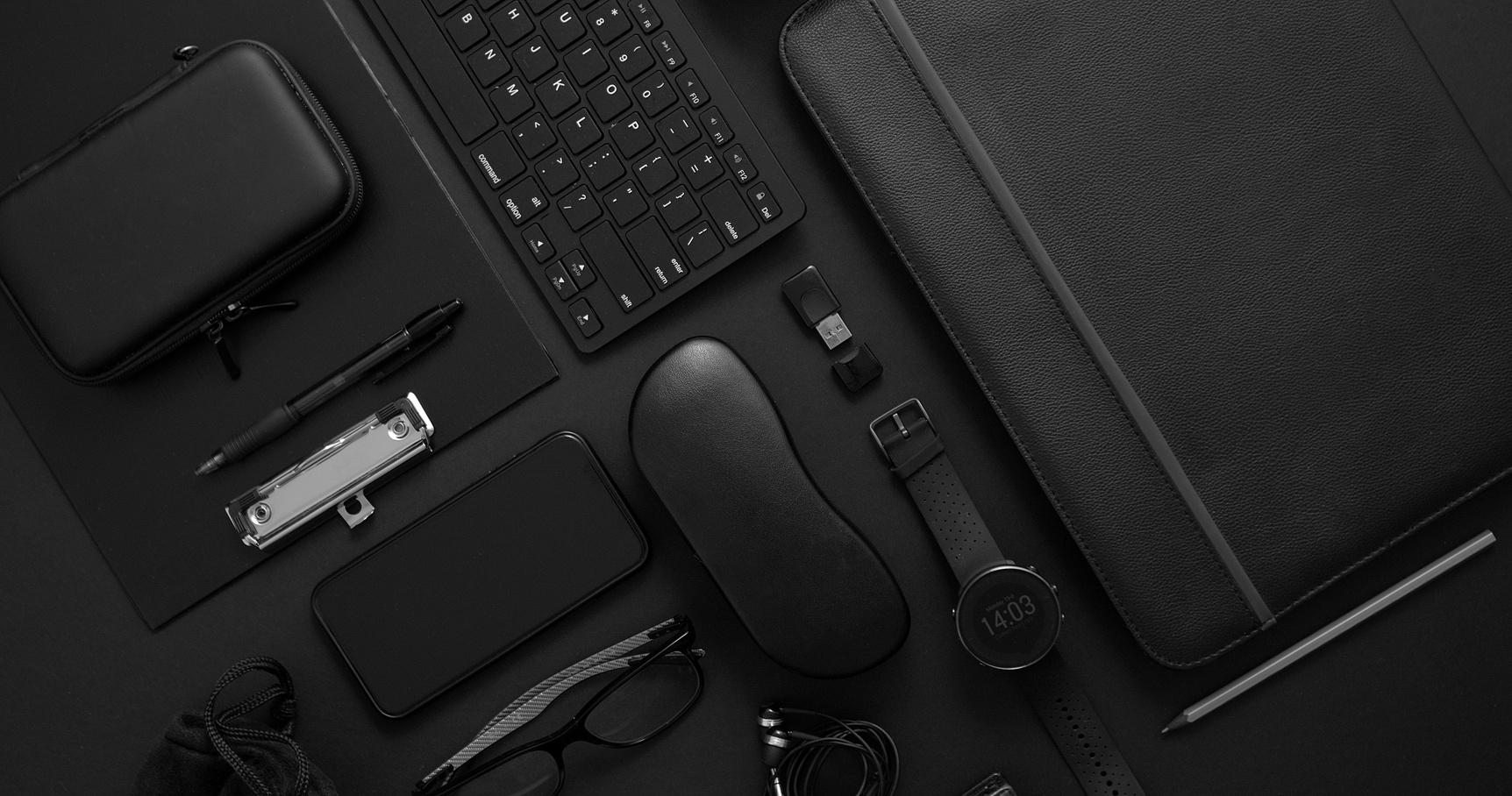 Composition of Black Office Gadgets and Accessories Flatlay